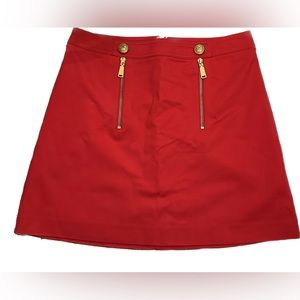 Express: red mid rise skirt.
